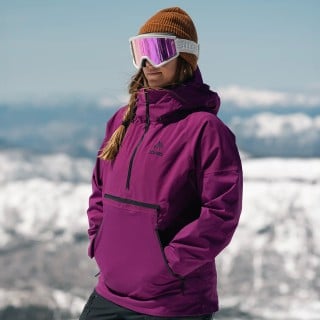 Ali Miller is wearing the Women's MTN Surf Recycled Anorak in Deep Purple