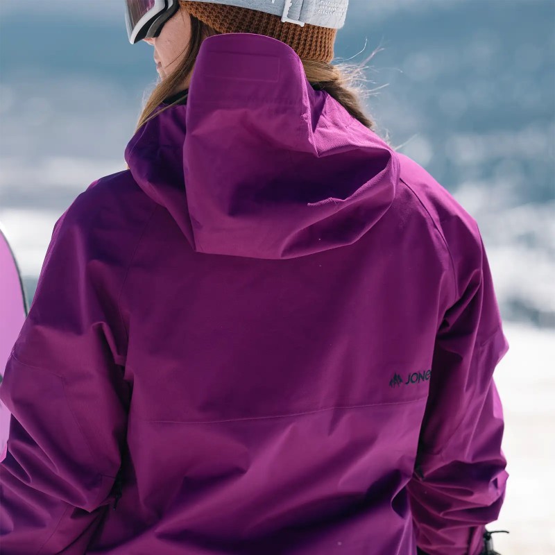 Ali Miller is wearing the Women's MTN Surf Recycled Anorak in Deep Purple