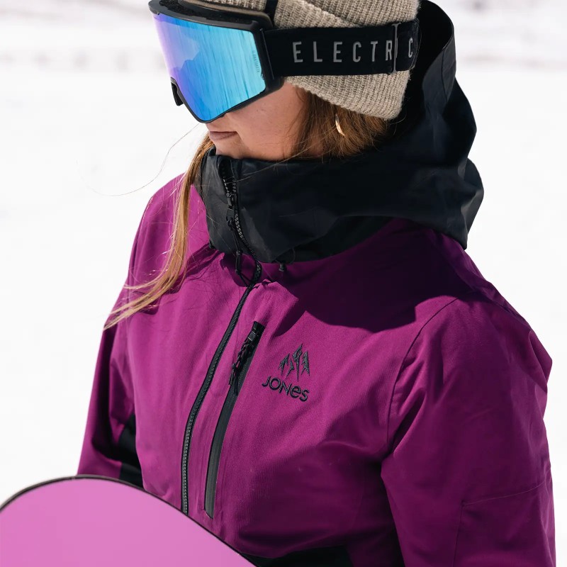 Ali Miller is wearing the Women's MTN Surf Recycled Jacket in Deep Purple