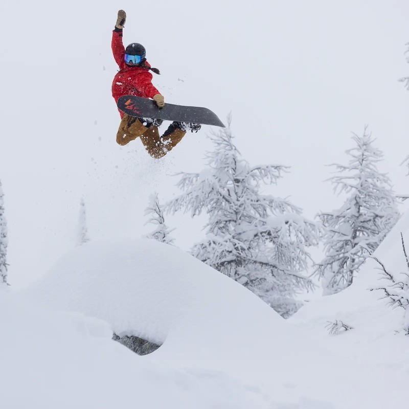 Jones rider Marissa Krawczak wearing the Women's Shralpinist Stretch Recycled Bibs in Sierra Brown