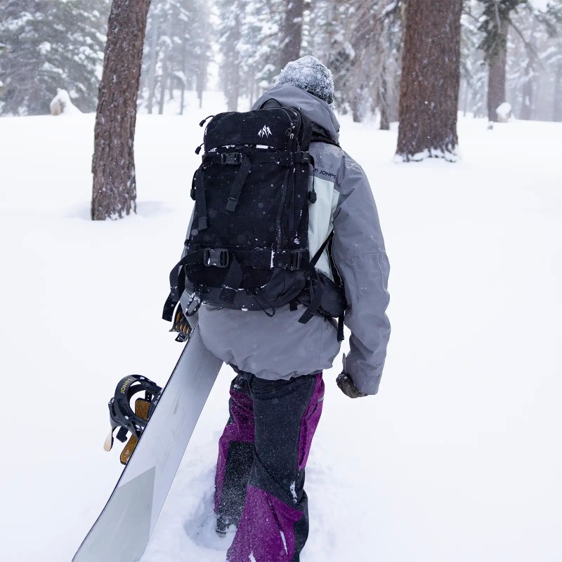 Rider Tyler Morton wears the Men's MTN Surf Recycled Bibs in Deep Purple