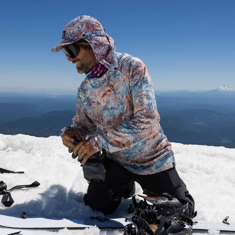 Jeremy Jones wears the Shasta Recycled Tech Hoodie during a spring splitboarding session.